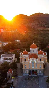 Photo of Megali Panagia taken at sunset with kink to the page