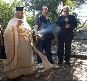 Priest blessing the day